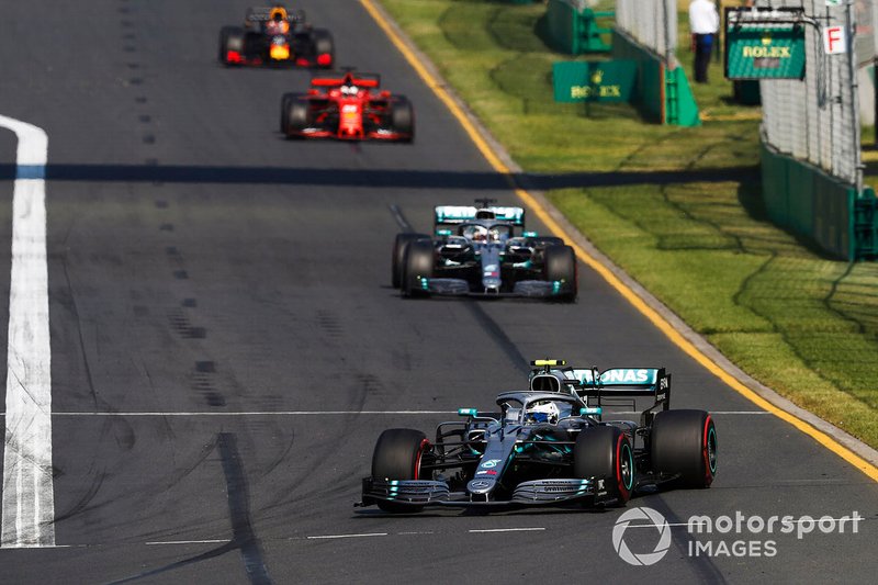 Valtteri Bottas, Mercedes AMG W10, leads Lewis Hamilton, Mercedes AMG F1 W10, and Sebastian Vettel, Ferrari SF90