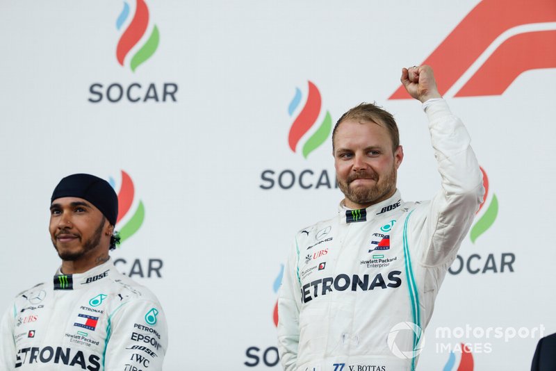 Lewis Hamilton, Mercedes AMG F1, 2nd position, and Valtteri Bottas, Mercedes AMG F1, 1st position, on the podium