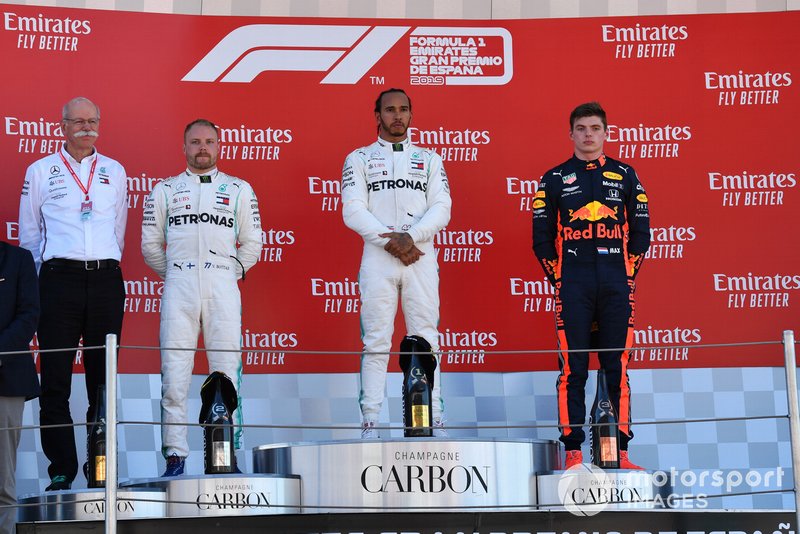 Dr Dieter Zetsche, CEO, Mercedes Benz Valtteri Bottas, Mercedes AMG F1, 2nd position, Lewis Hamilton, Mercedes AMG F1, 1st position, and Max Verstappen, Red Bull Racing, 3rd position, on the podium