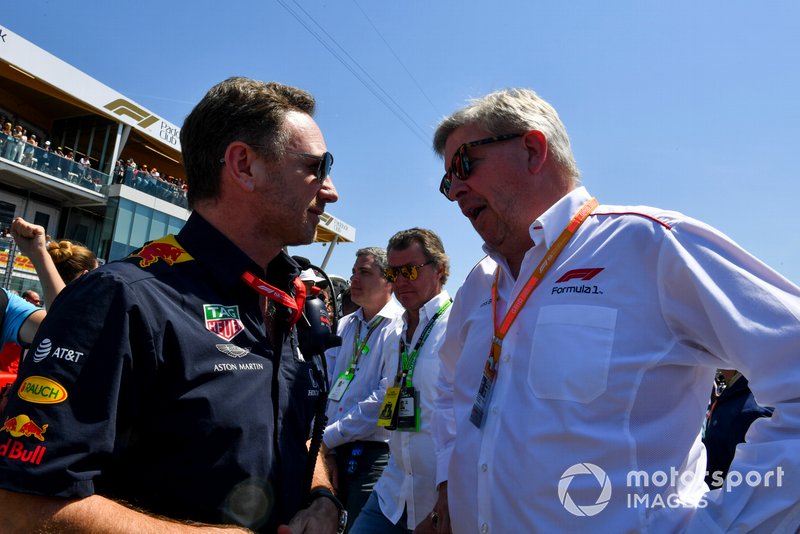 Christian Horner, Team Principal, Red Bull Racing and Ross Brawn, Managing Director of Motorsports, FOM on the grid