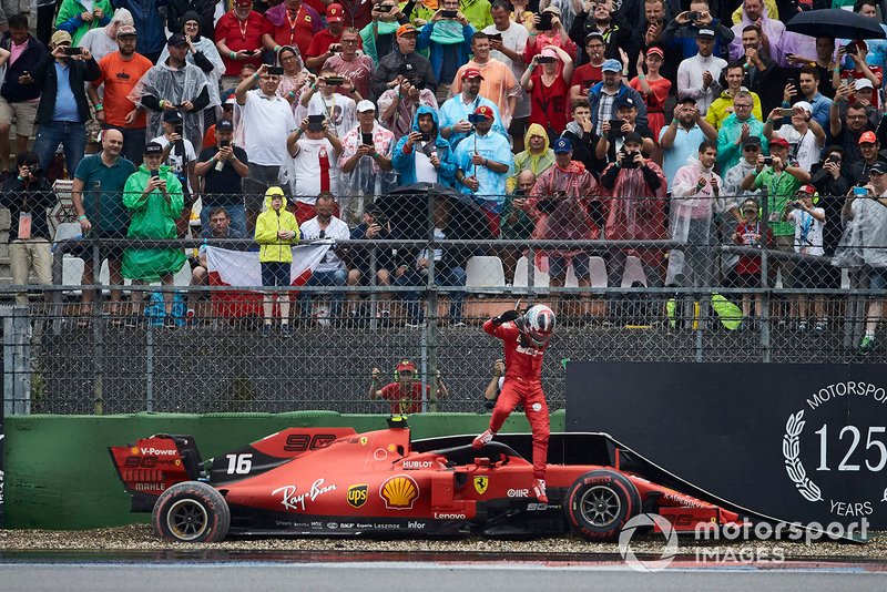 Charles Leclerc, Ferrari, climbs out of his damaged car