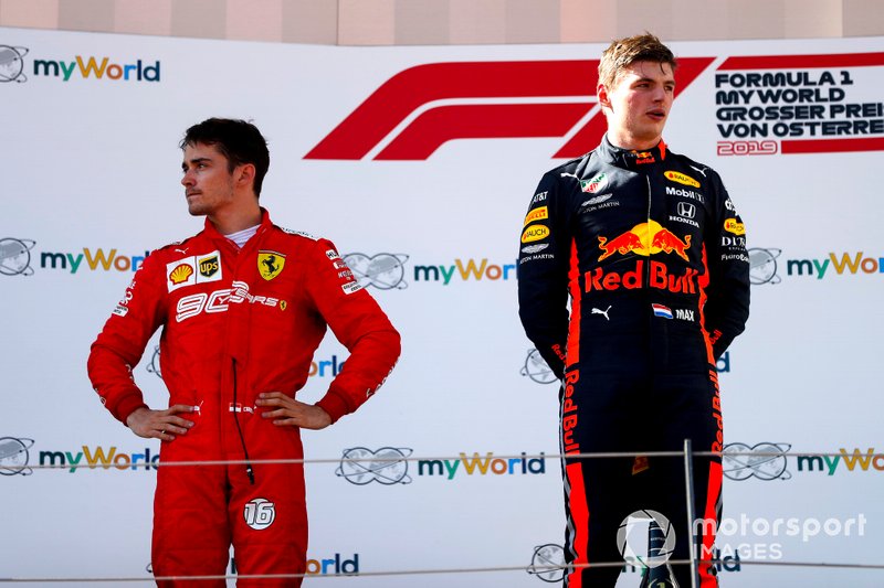 Charles Leclerc, Ferrari and Race winner Max Verstappen, Red Bull Racing on the podium 