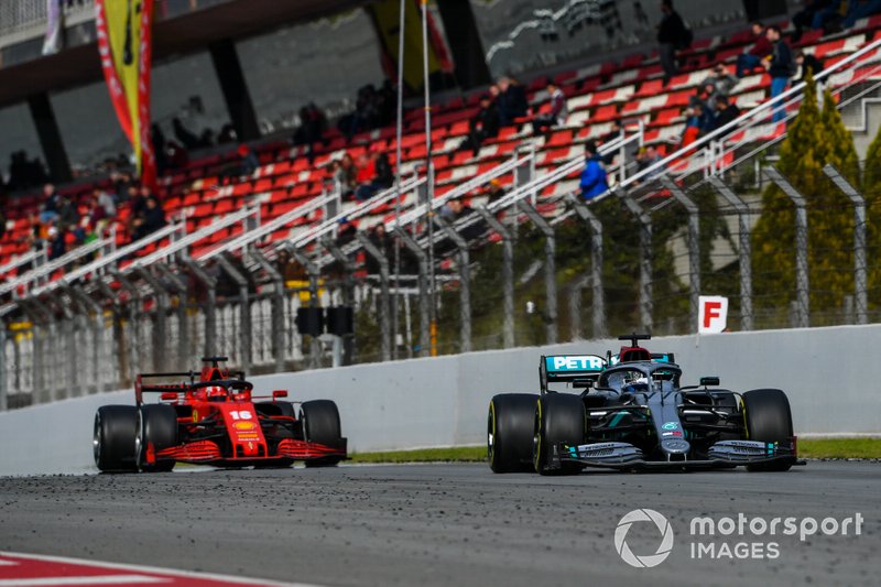 Valtteri Bottas, Mercedes F1 W11, leads Charles Leclerc, Ferrari SF1000