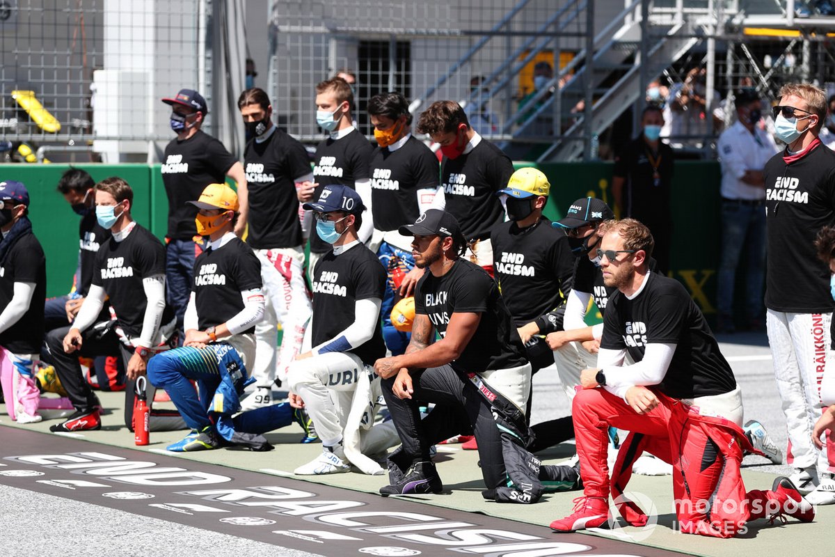 Lewis Hamilton, Mercedes-AMG Petronas F1, and the drivers take a knee on the grid