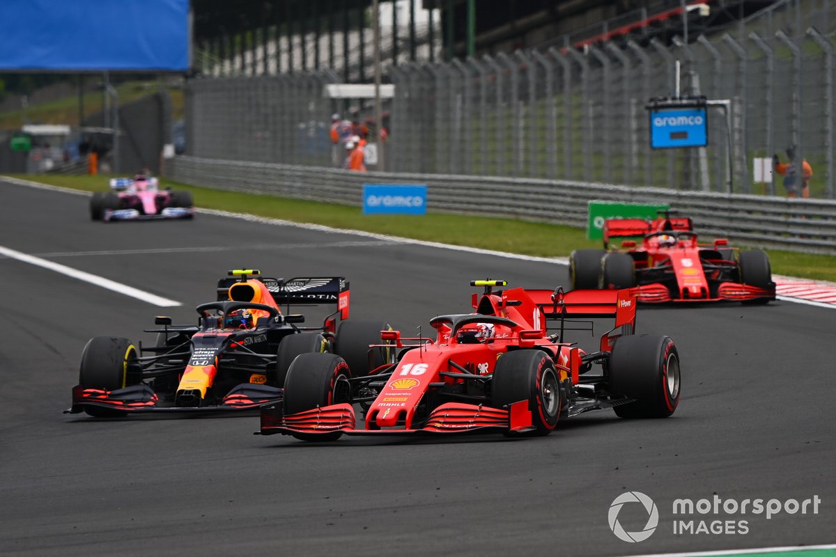 Charles Leclerc, Ferrari SF1000, battles with Alex Albon, Red Bull Racing RB16, ahead of Sebastian Vettel, Ferrari SF1000