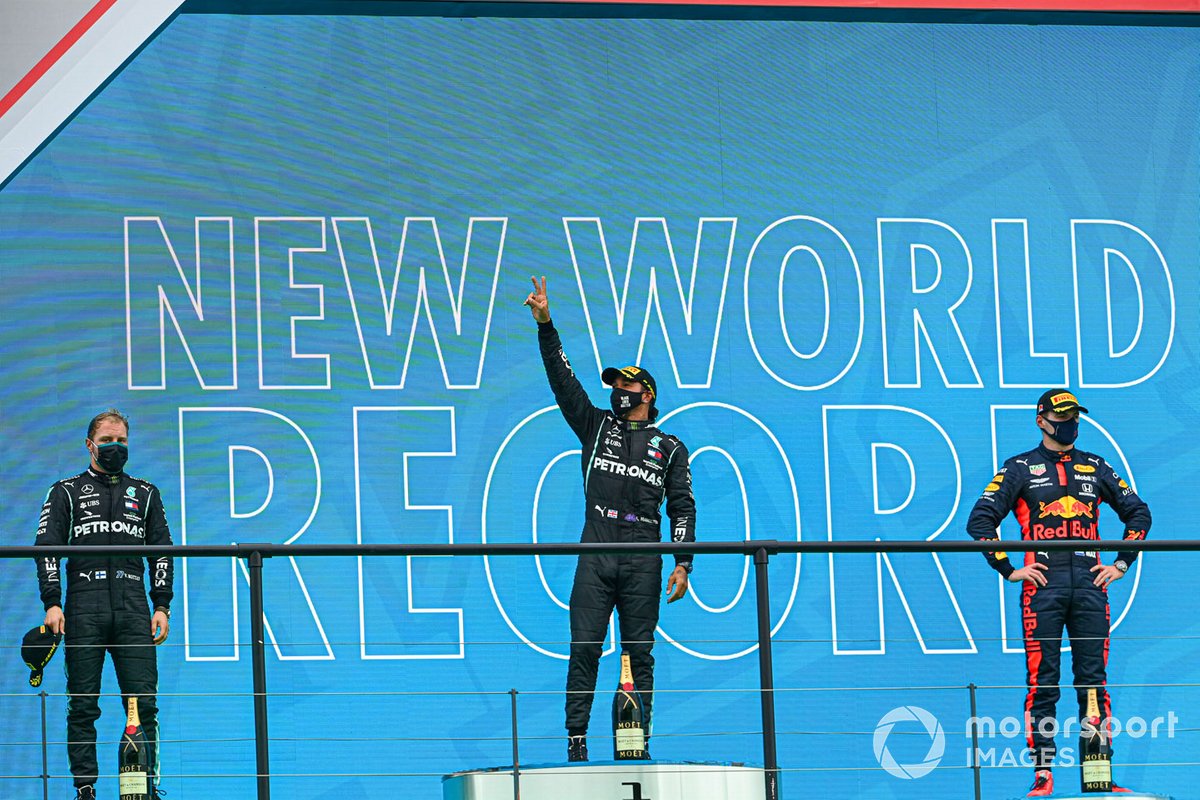 Lewis Hamilton, Mercedes F1 W11, 1st position, takes his 92nd Grand Prix win, the most for any driver in F1 history, with Valtteri Bottas, Mercedes-AMG F1, 2nd position, and Max Verstappen, Red Bull Racing, 3rd position, on the podium