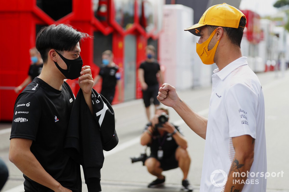 Guanyu Zhou, test driver, Alpine F1, with Daniel Ricciardo, McLaren 