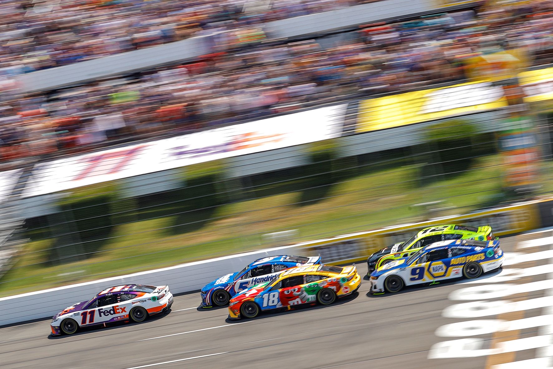 2022-Pocono-Cup-Denny-Hamlin-kyle-busch-kyle-larson-chase-elliott-racing-Tim-Nwachukwu-getty.jpg